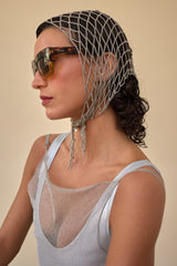 woman wearing chain woven bandana with sunglasses.