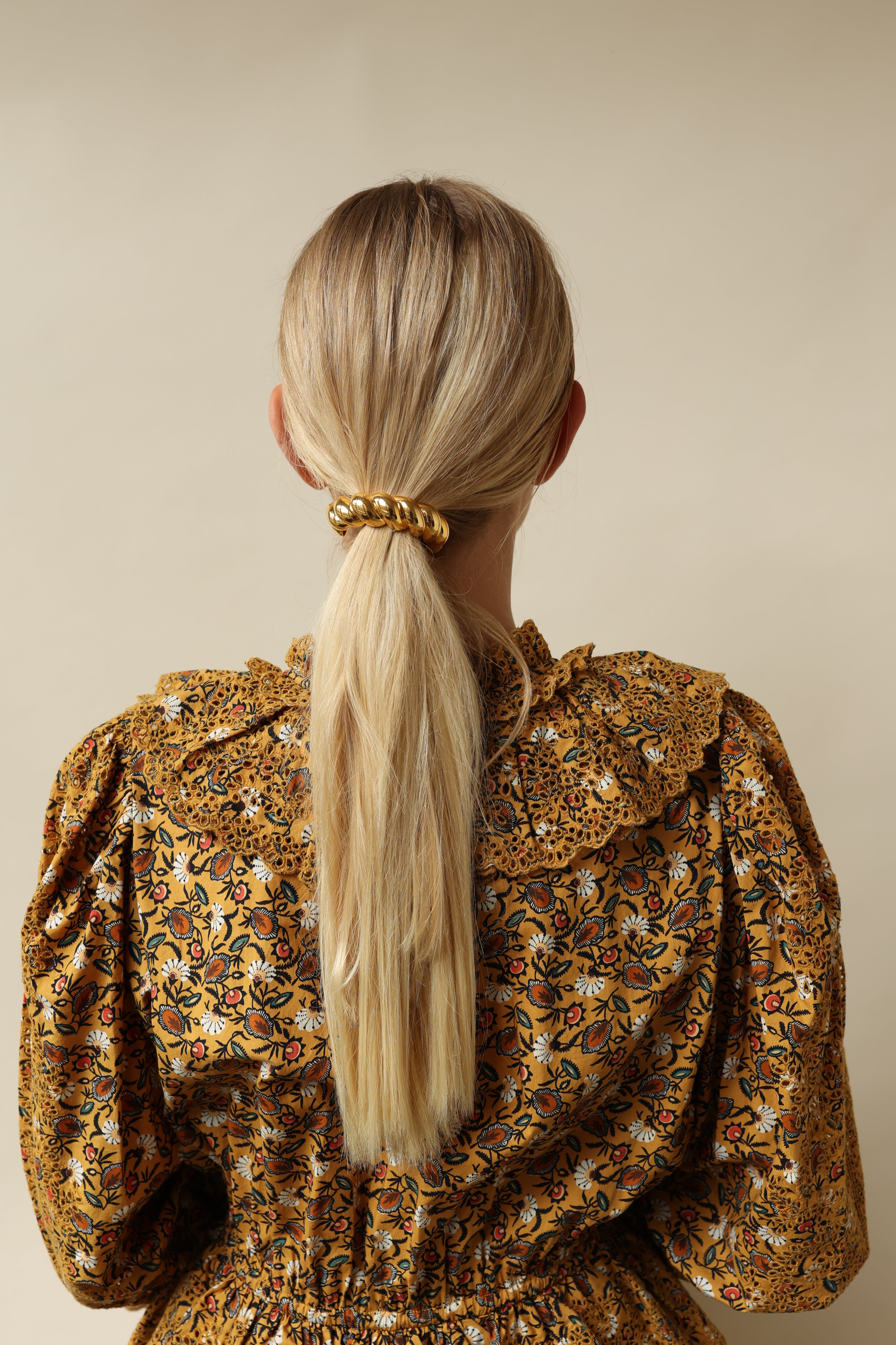 Glossy Twist Pony Cuff